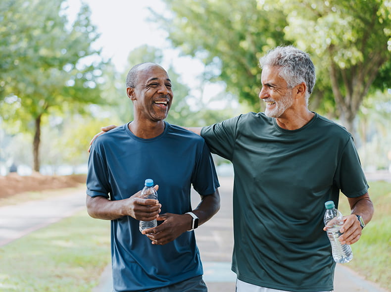 Two men exercising outside