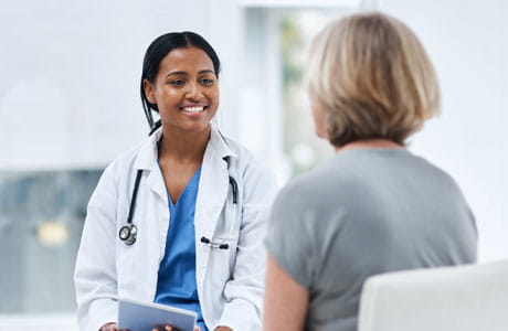 A doctor talking to a patient