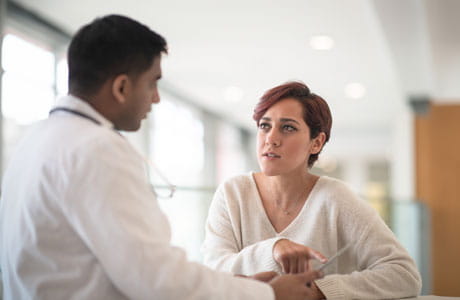 A Doctor talking to a family member