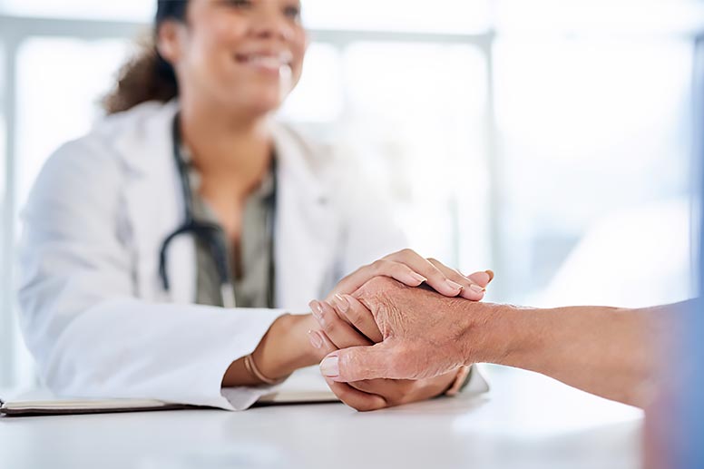 Patient receiving comfort from a loved one.