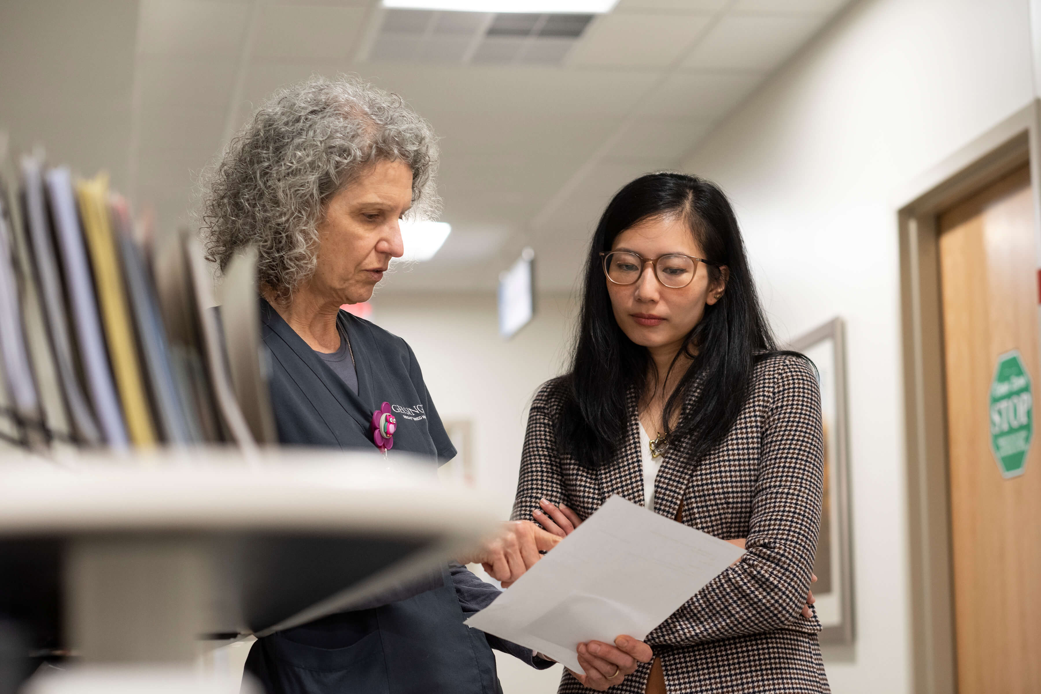 A woman consults with a nurse
