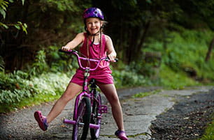 Mother and baby looking at a laptop
