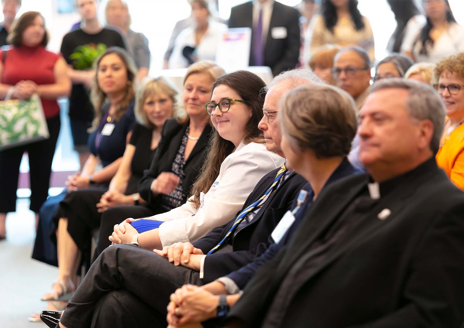 Olivia Zehel, a medical student at Geisinger Commonwealth School of Medicine, is featured in this meeting photograph.